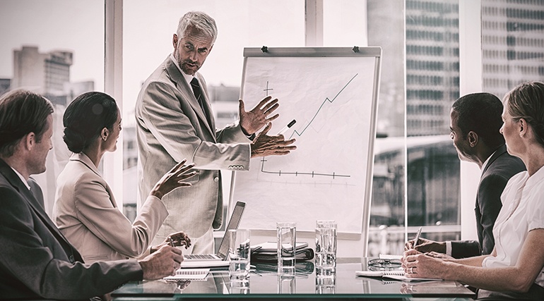 Businessman discussing about enterprise mobility during a meeting