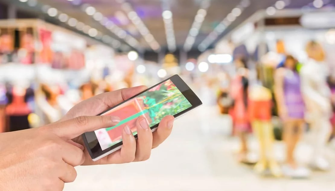 Conference_using_a_mobile_phone_cropped_and_sized