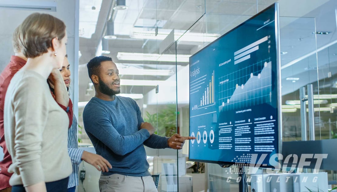 Data Engineers looking at dashboard powered by ServiceNow Process Optimization