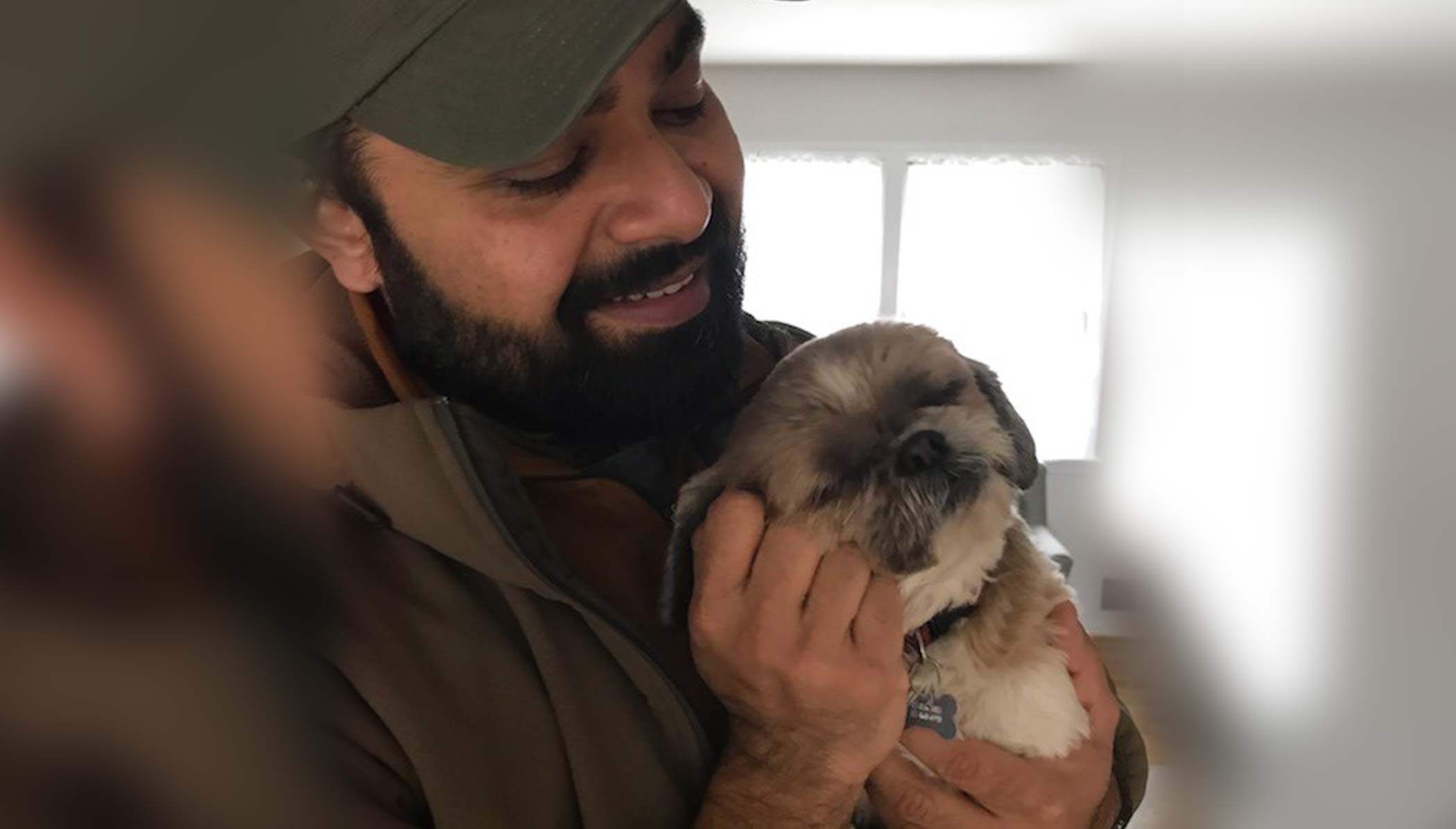 Mohammad Husain, V-Soft Consulting Senior technical recruiter Harrisburg office with his shih tzu