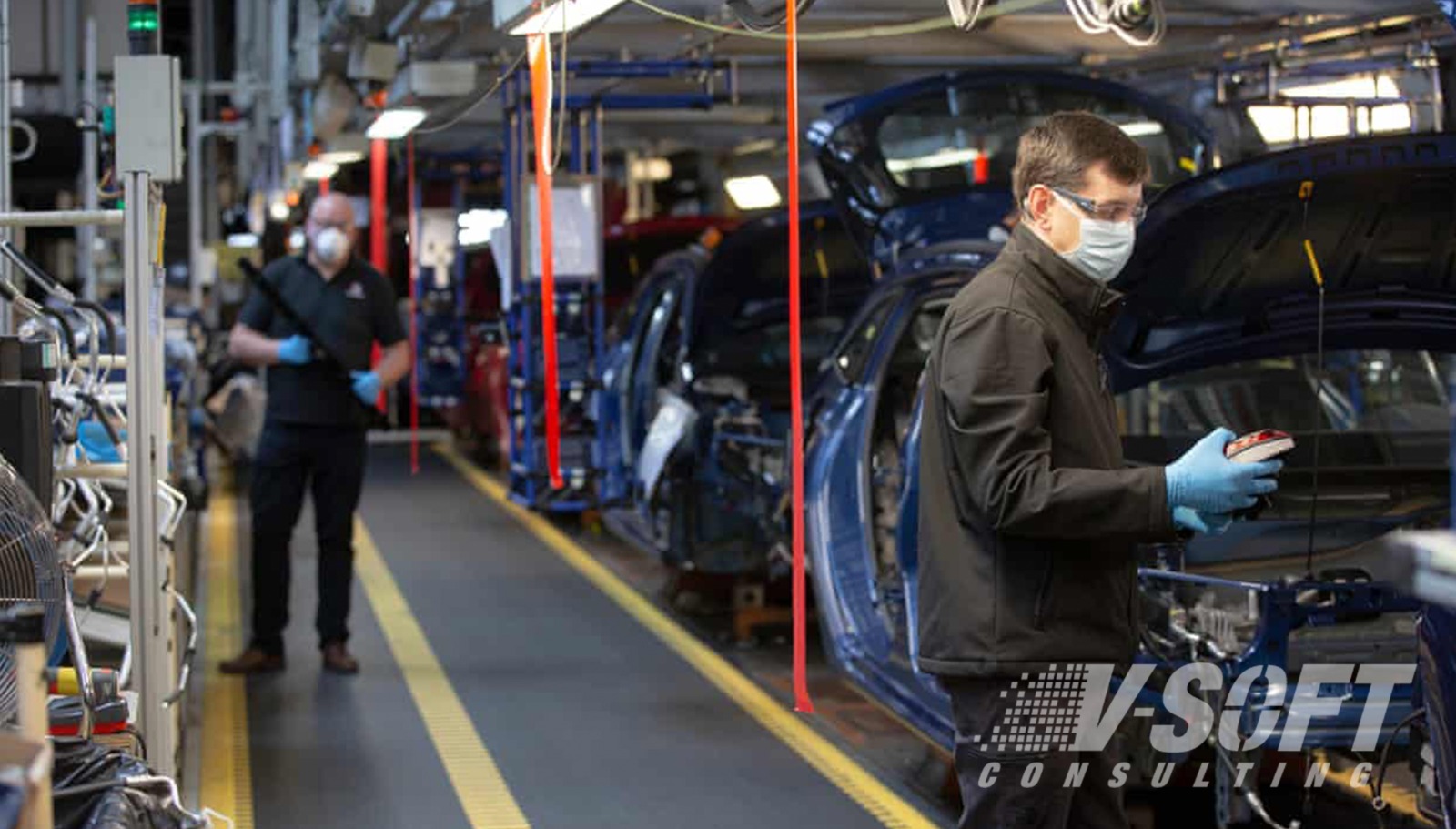 Employees Performing Assembly in Automobile Industry