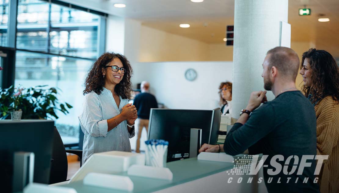 Government official serving citizens at computer using RPA
