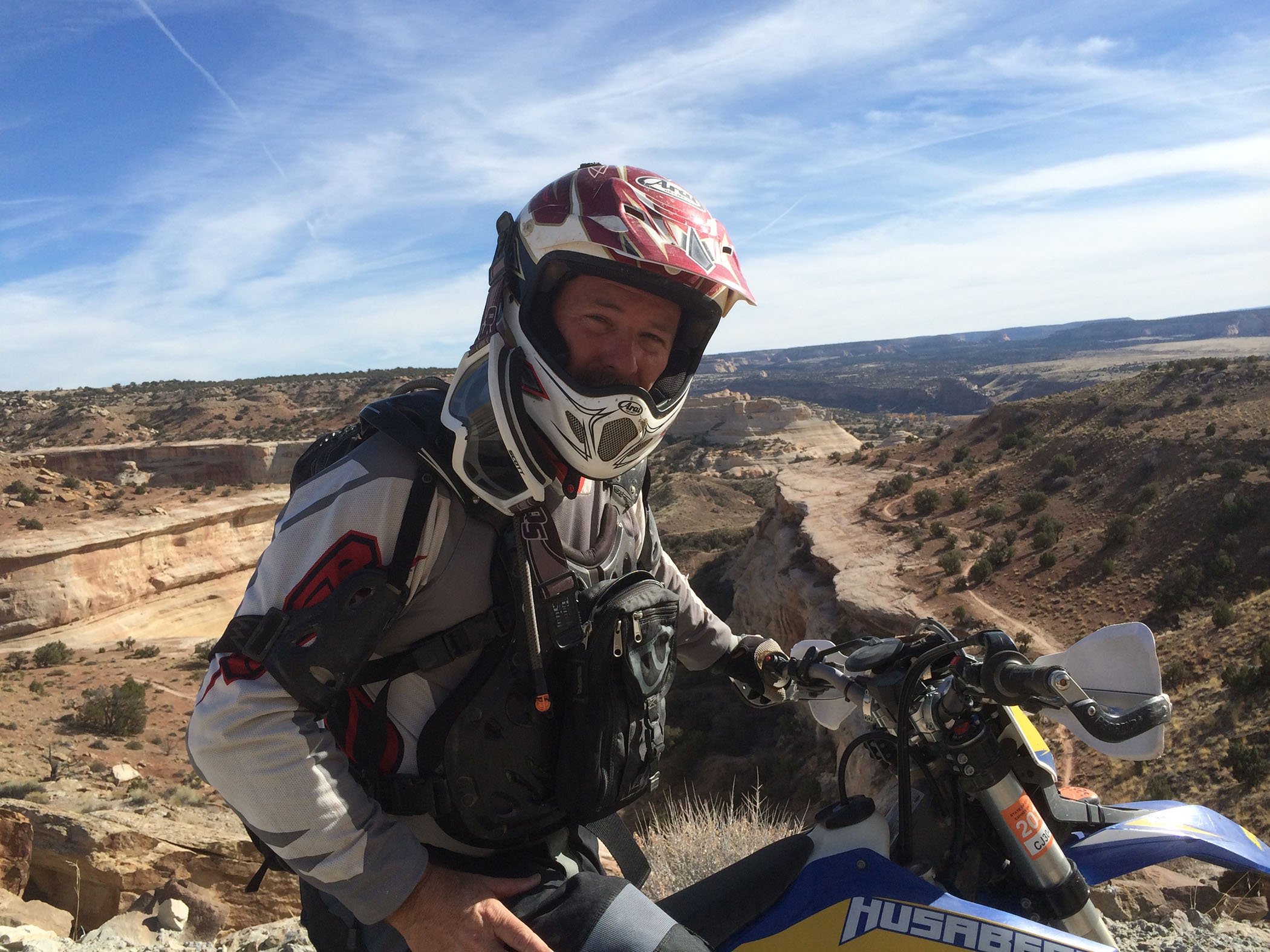 Greg Loftin, our Service Now Expert sits on his dirt bike in Denver.