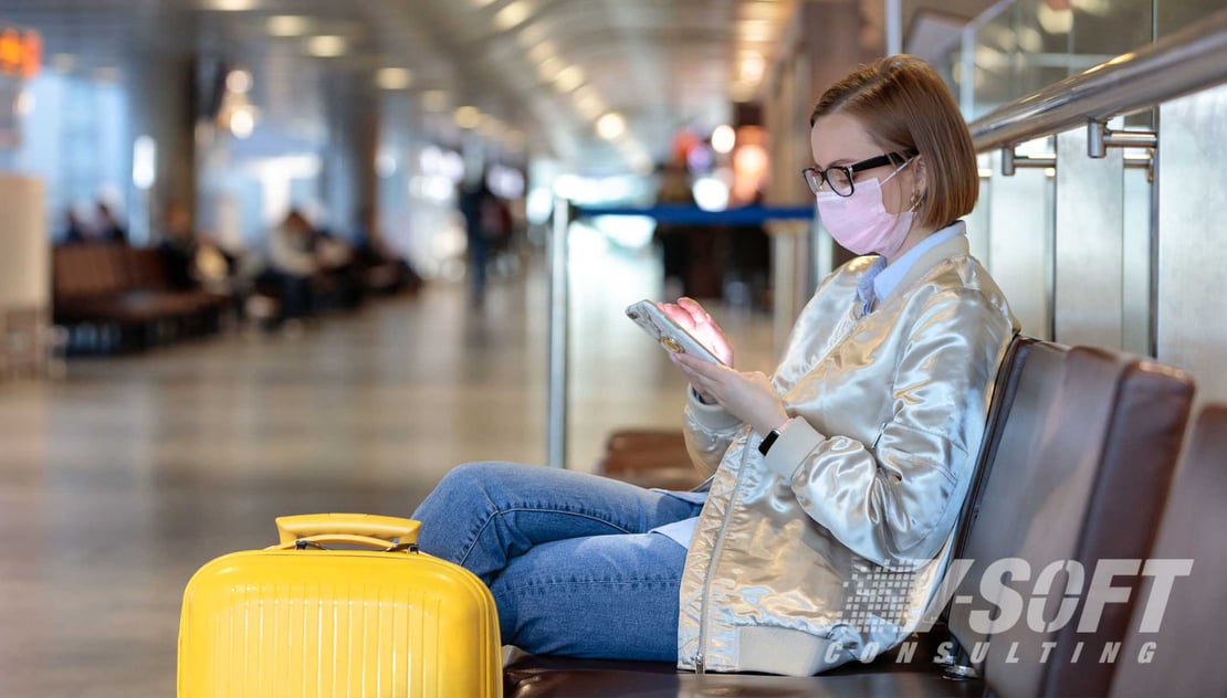 Woman on phone receiving COVID-19 updates from chatbot