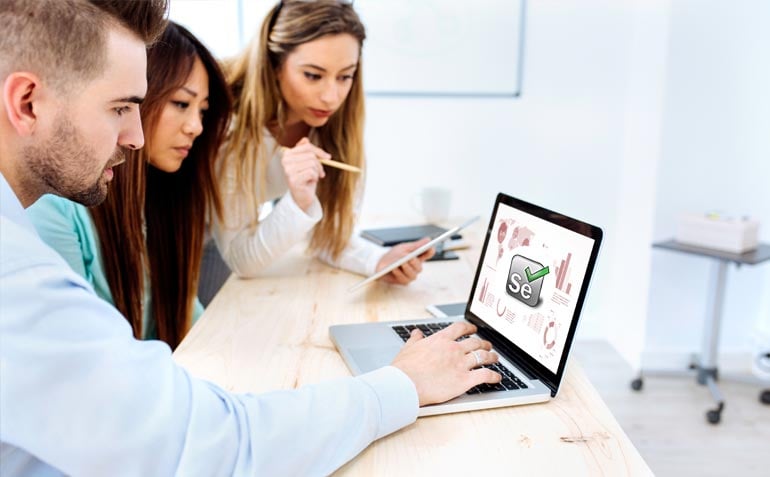 Software Testing professionals analyzing reports generated by Selenium Automation tool