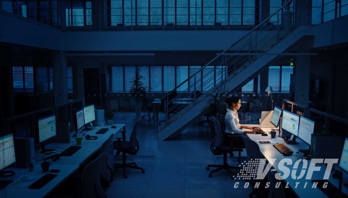 One IT professional sitting alone in understaffed IT office.