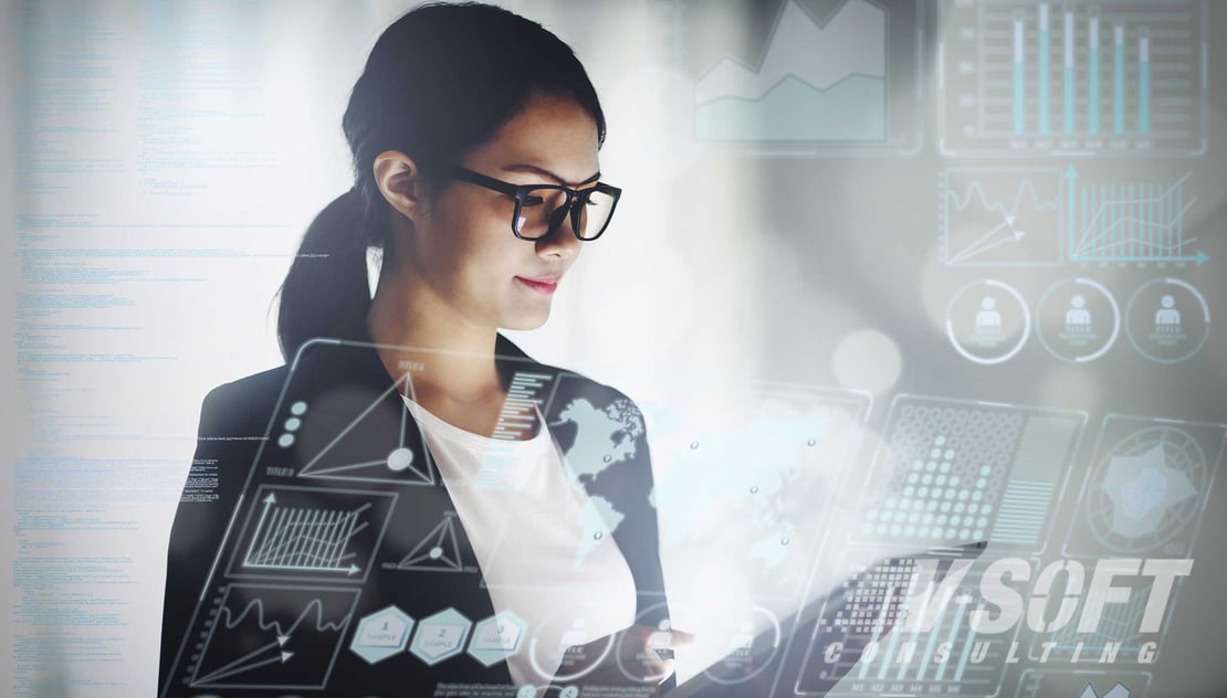 Woman on computer researching if her organization is ready for AI