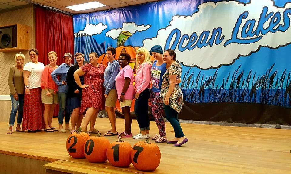 V-Soft Consulting propoals manager stands with other participants of a Little Pink Retreat.