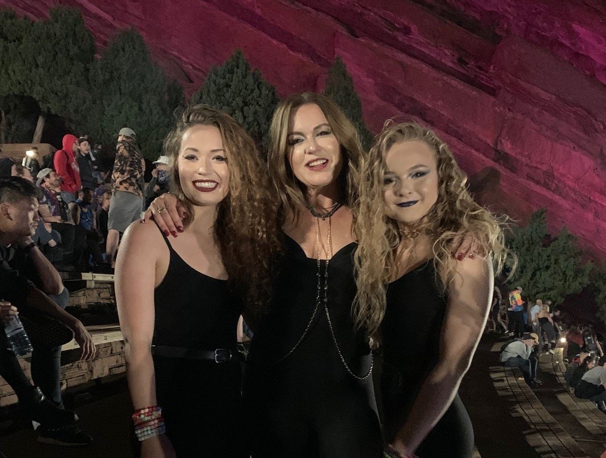 Lisa Sutherland with her daughters a Red Rocks Amphitheatre Colorado  