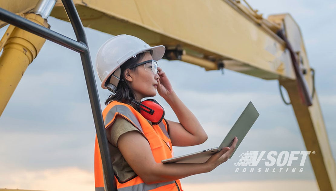 Female engineer checking quality of water as part of her ESG strategy.